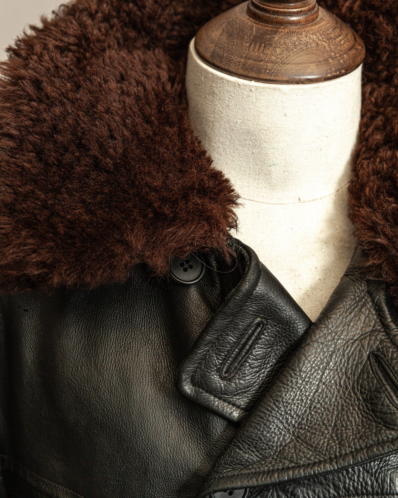 close-up of thick brown wool from the collar of a swedish army trench coat from the 1940s
