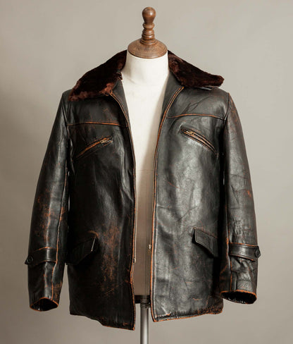 Vintage French leather workwear jacket with removable sheepskin liner and wool plaid interior