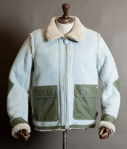 Men’s Diesel Heritage shearling aviator jacket in ice blue suede with olive green pockets and cream sheepskin collar, as worn by Justin Bieber