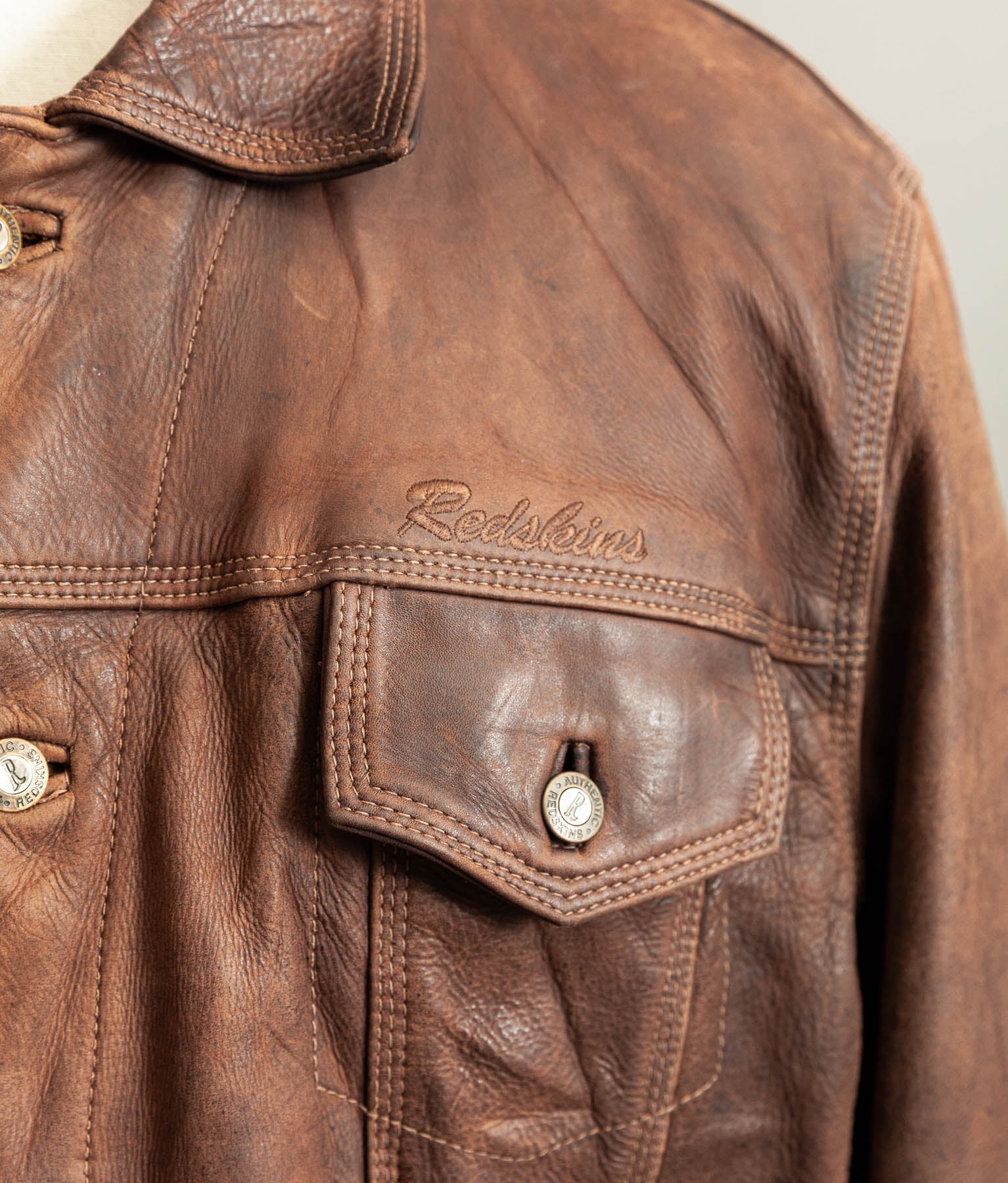 Vintage 1990s Redskins Buffalo Hide Leather Trucker Jacket