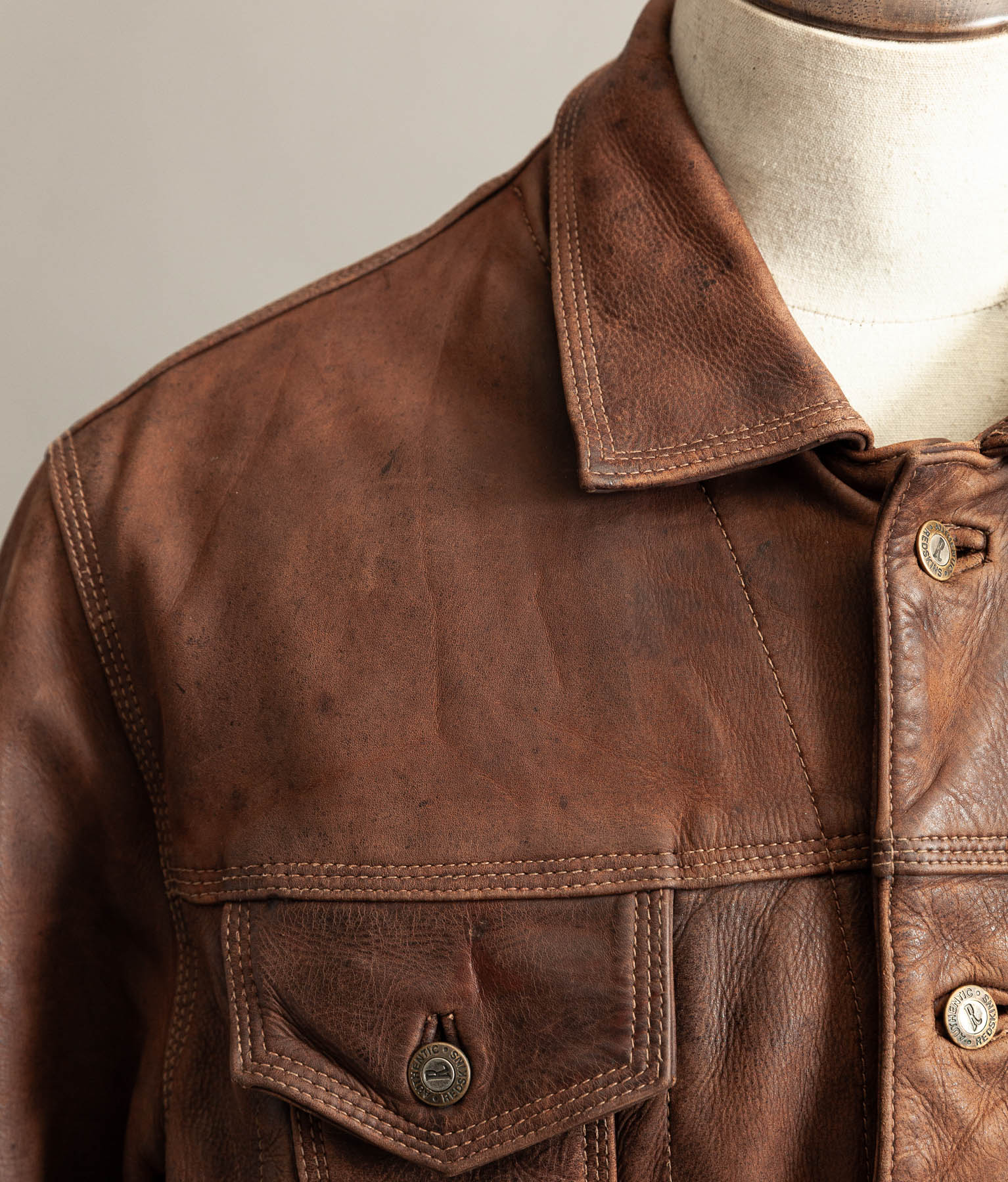 Vintage 1990s Redskins Buffalo Hide Leather Trucker Jacket